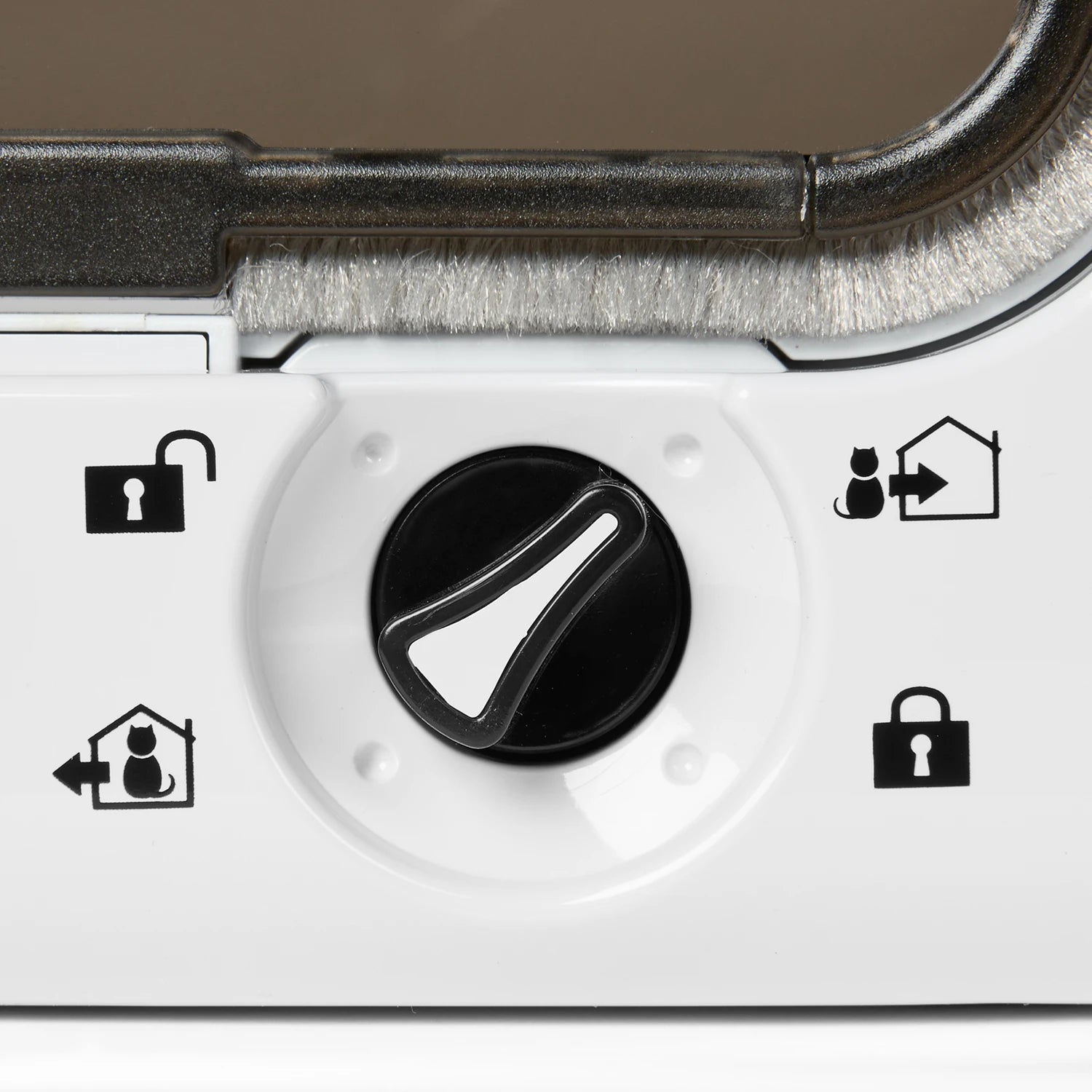 Control panel for the white cat flap with a knob and symbols on a white background