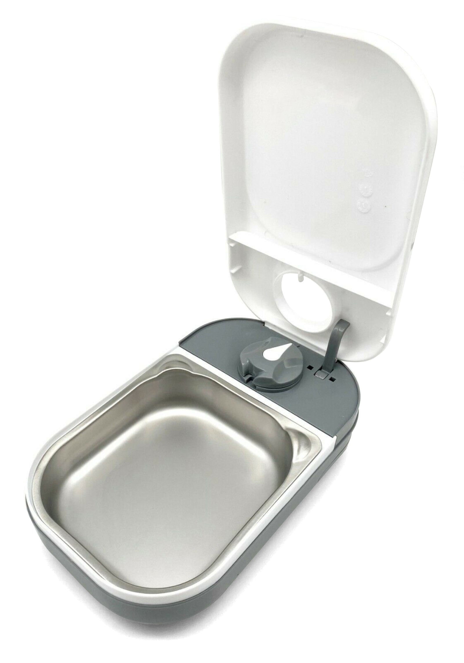 An empty one-meal pet feeder displaying the grey base, stainless steel bowl and white lid, on a white background