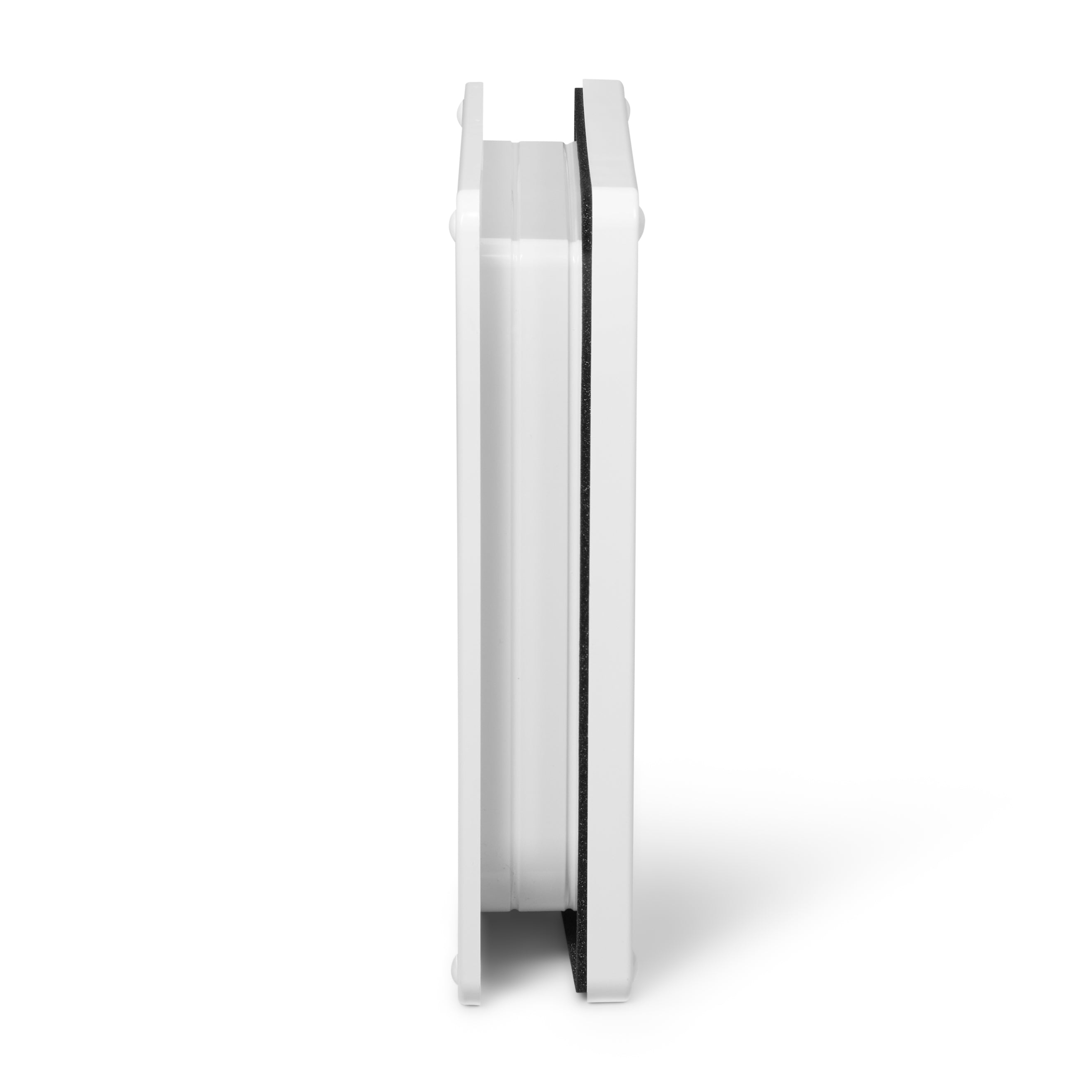 A side on view of the white framed pet door which is self-lining up to two inches thick and is suitable for installation in to a varity of doors, as well as panels and walls, on a white background 