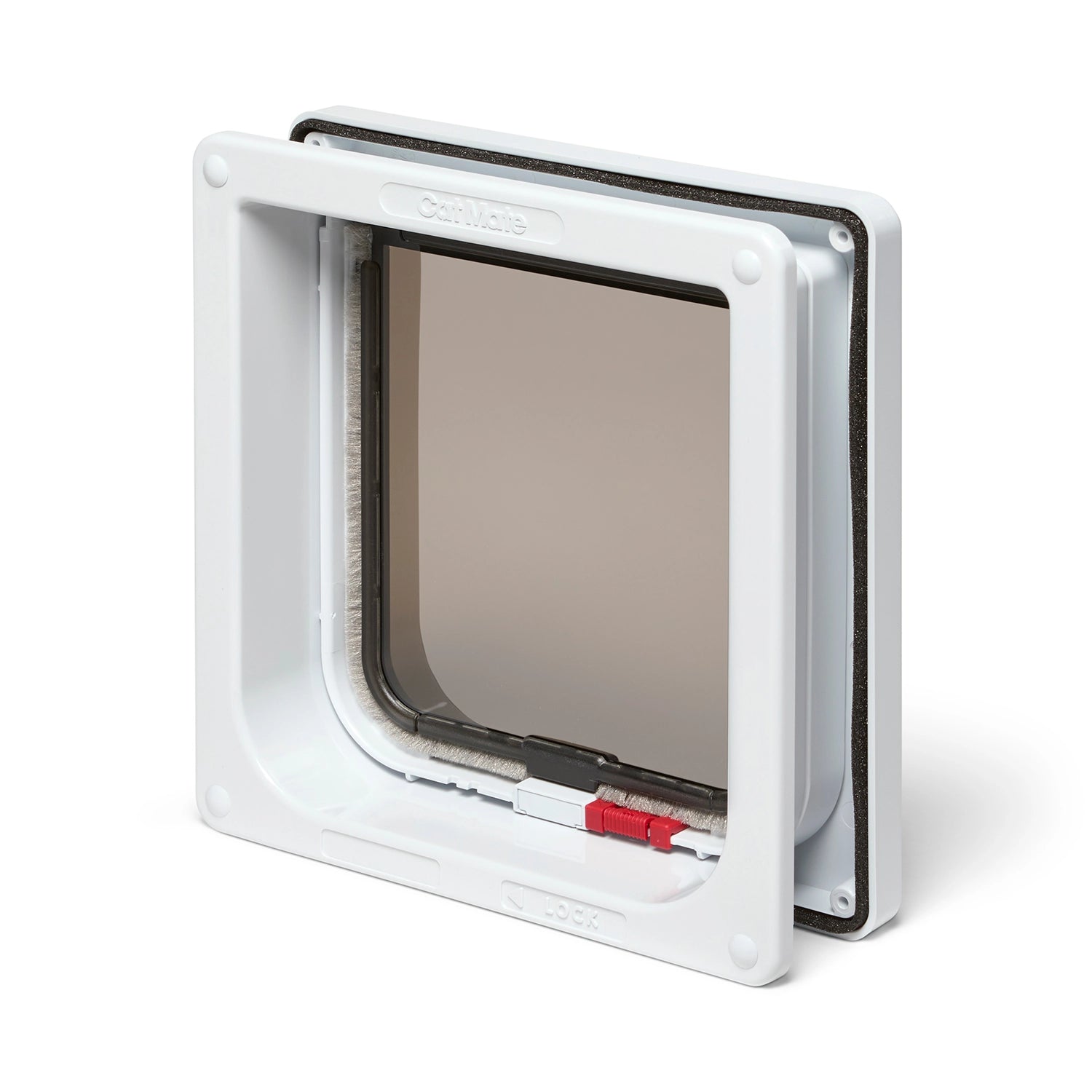 White lockable pet door with a transparent flap and displaying a red lock at the bottom, on a white background