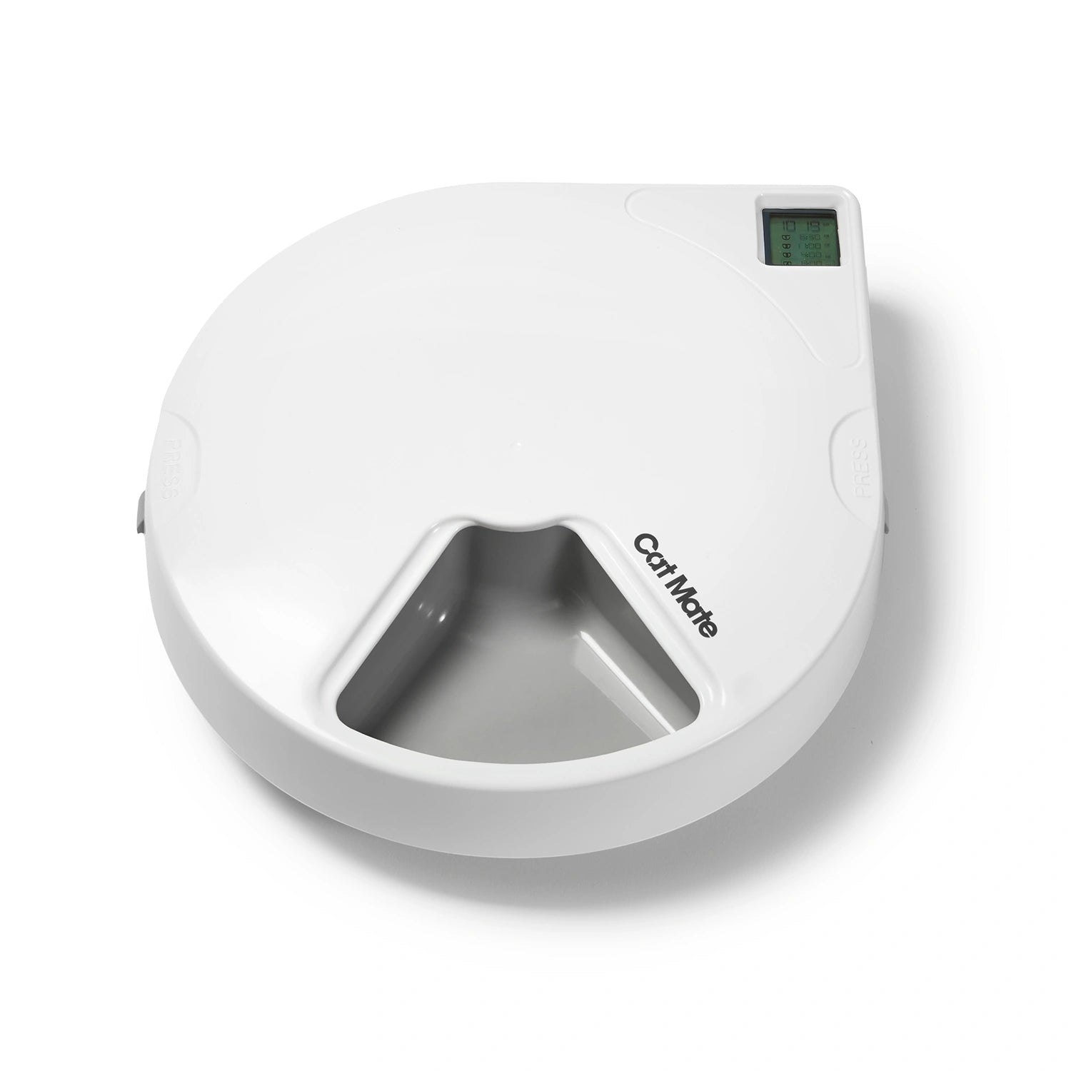 Top view of a white Cat Mate automatic pet feeder with a circular design. The feeder has a digital display screen in the top right corner and a visible feeding compartment at the front. The Cat Mate logo is printed near the food opening, and there are 'PRESS' buttons on both sides for lid release.