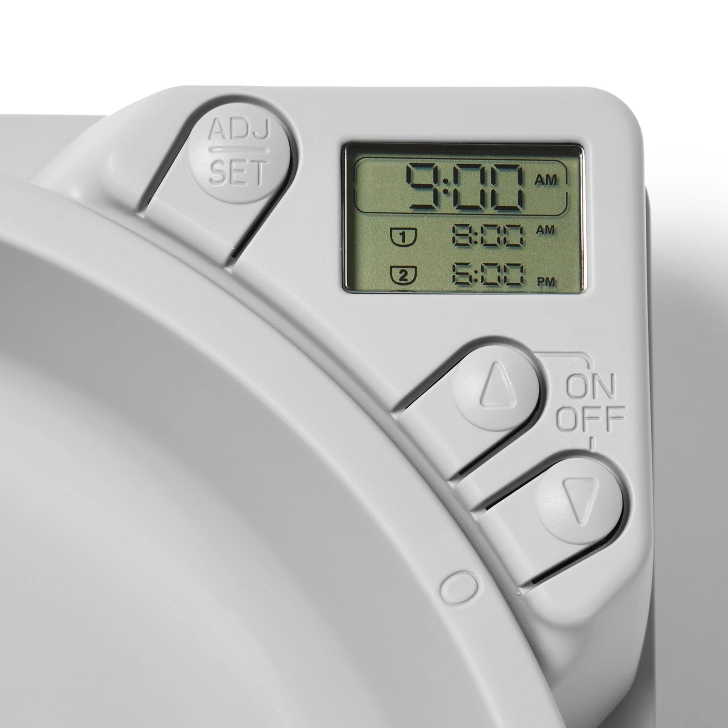 Digital thermostat with time display on a white background