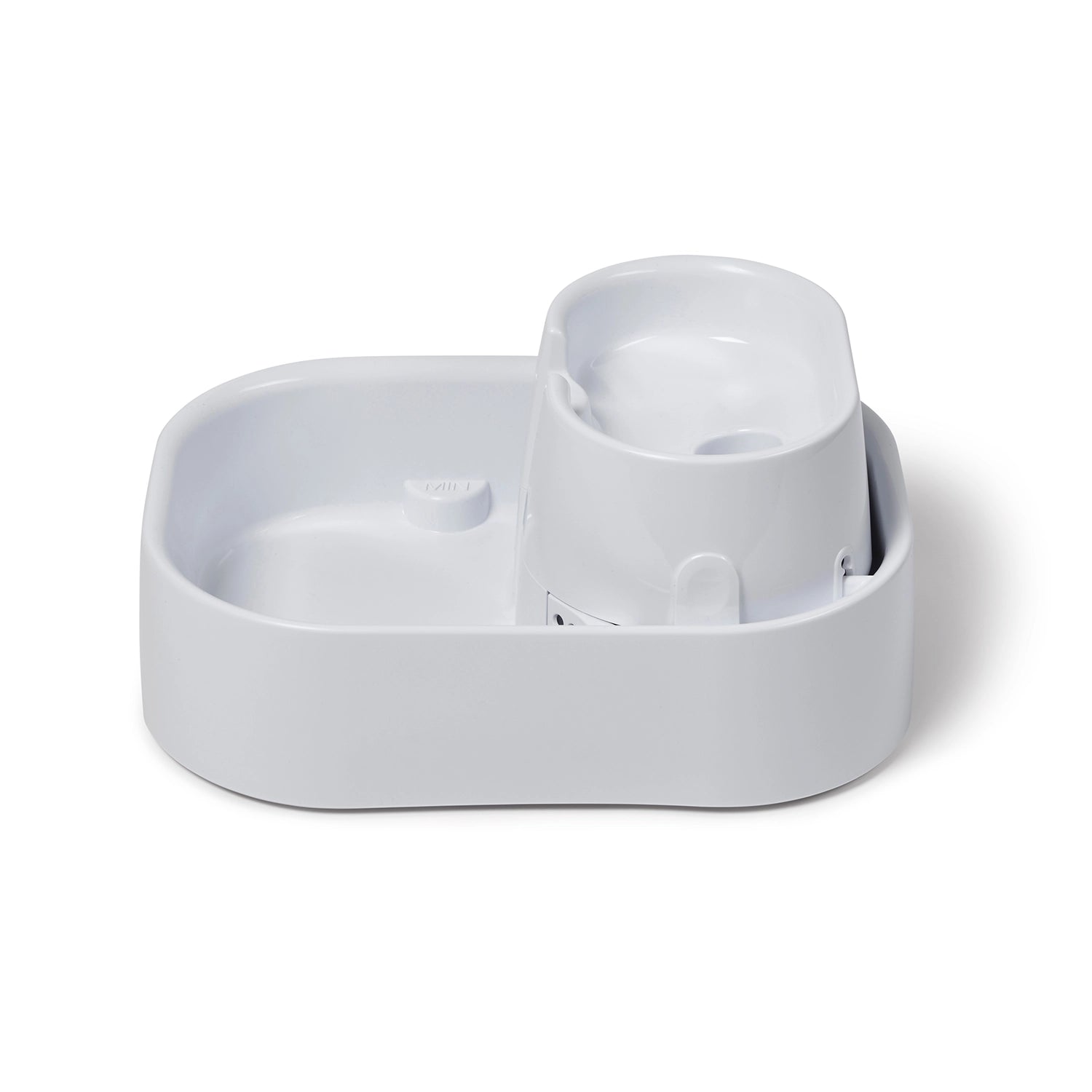 Side view of a white pet drinking fountain on a white background